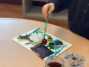 Mixed-media toddler collage and painting