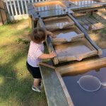 Toddler at the water table